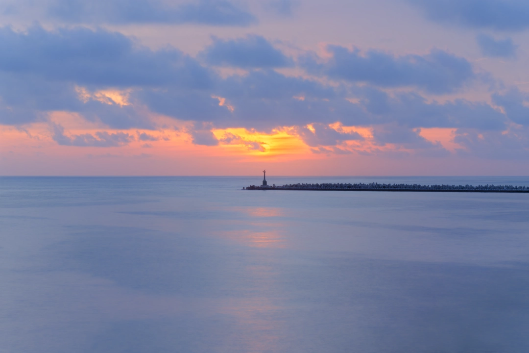 Sunset over the Taiwan Strait at Sizihwan, Kaohsiung, Taiwan.